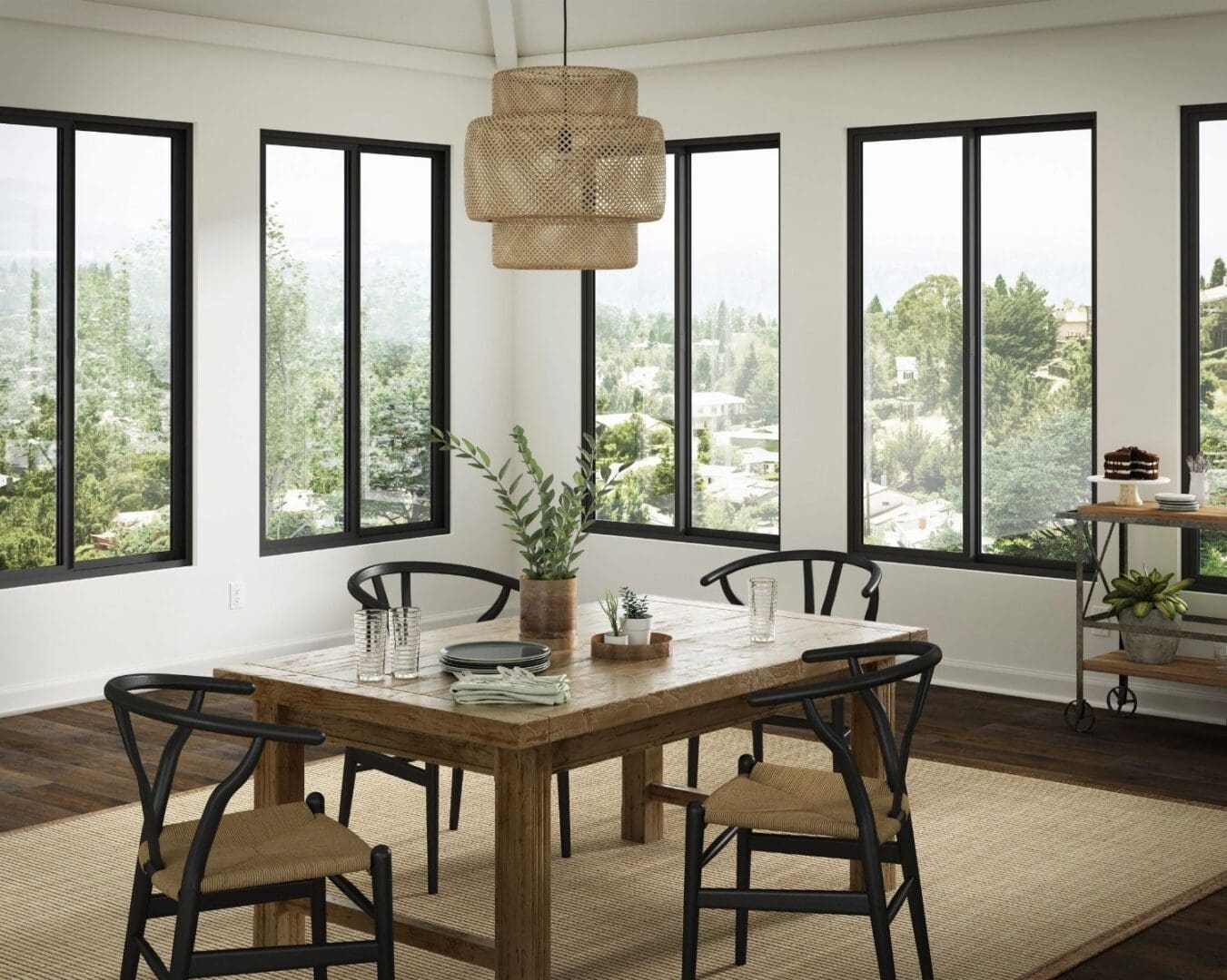 A dining room with four chairs and a table